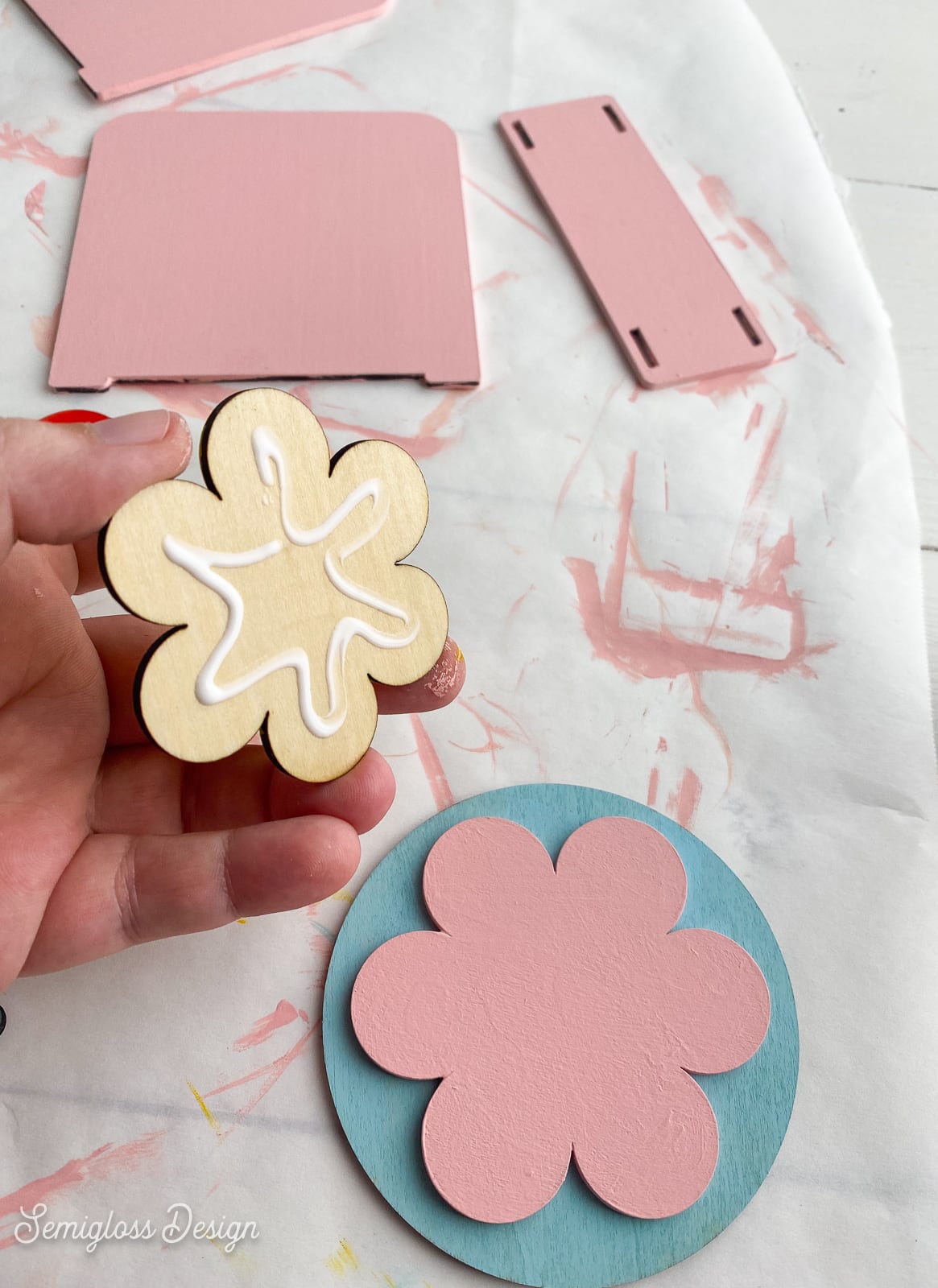 gluing laser cut flower design together