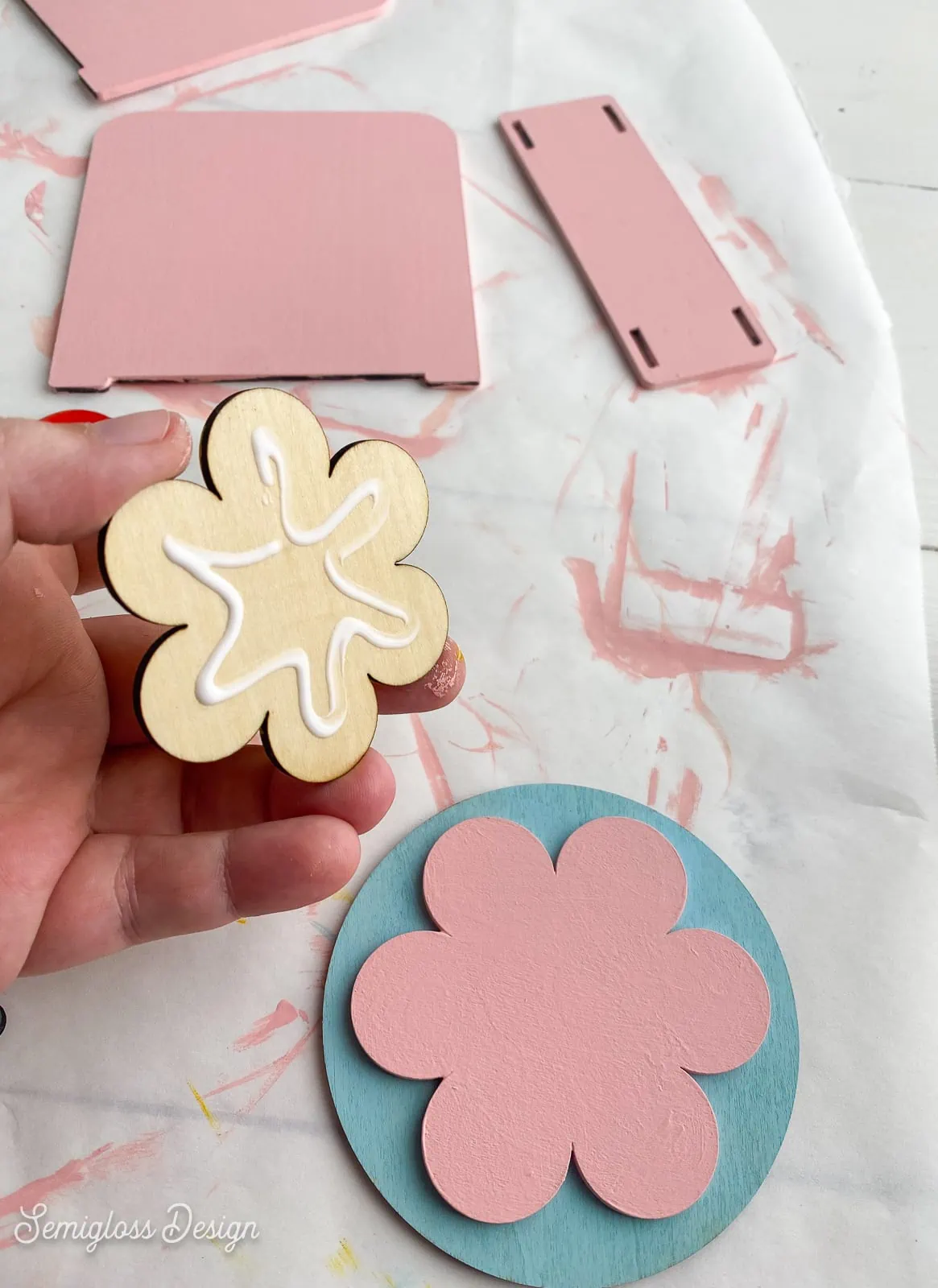 gluing laser cut flower design together