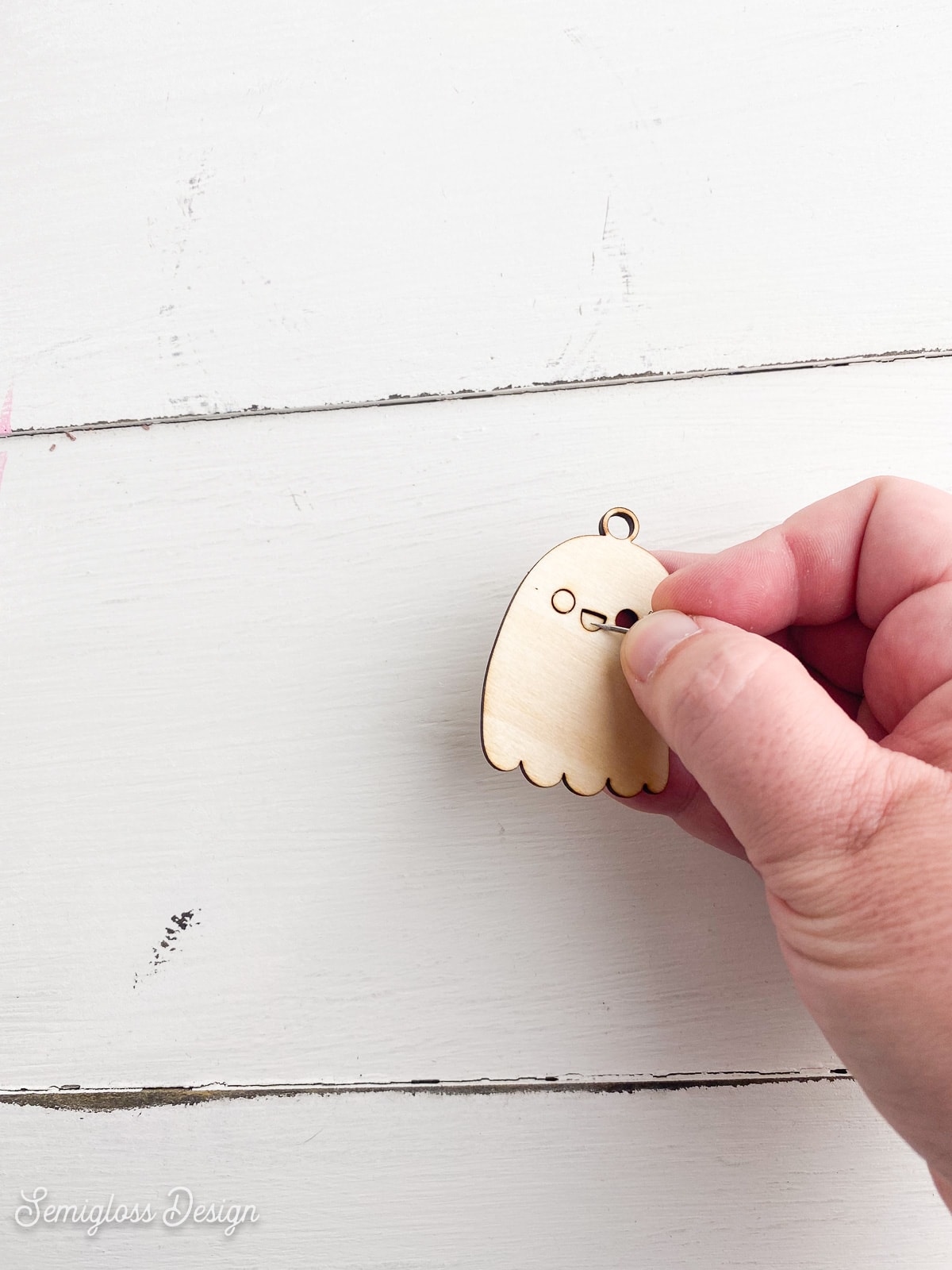 poking out unwanted laser cut shapes from ghost shape