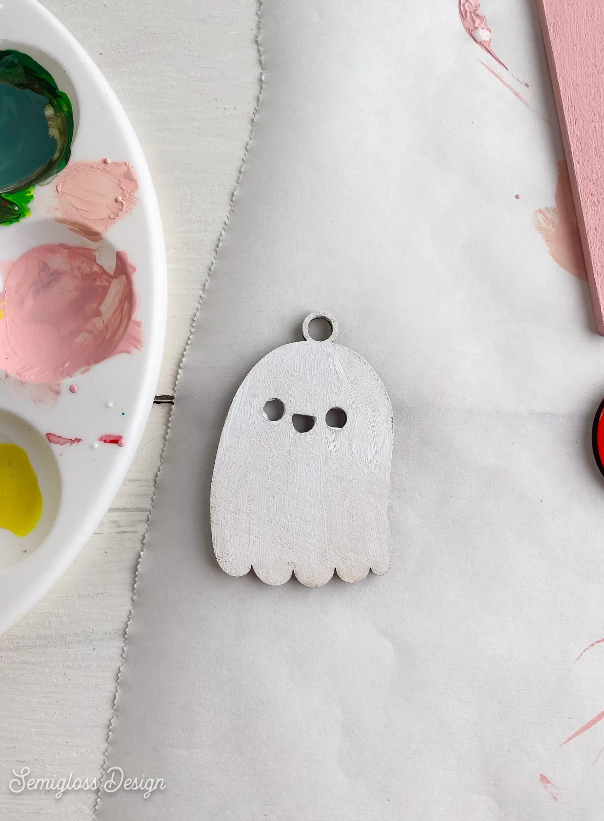 painting wooden ghost shape white