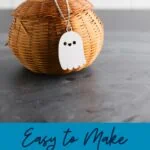 wicker pumpkin with wooden ghost pendant