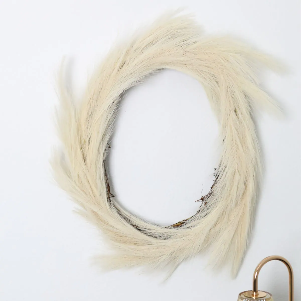 pampas grass wreath on wall