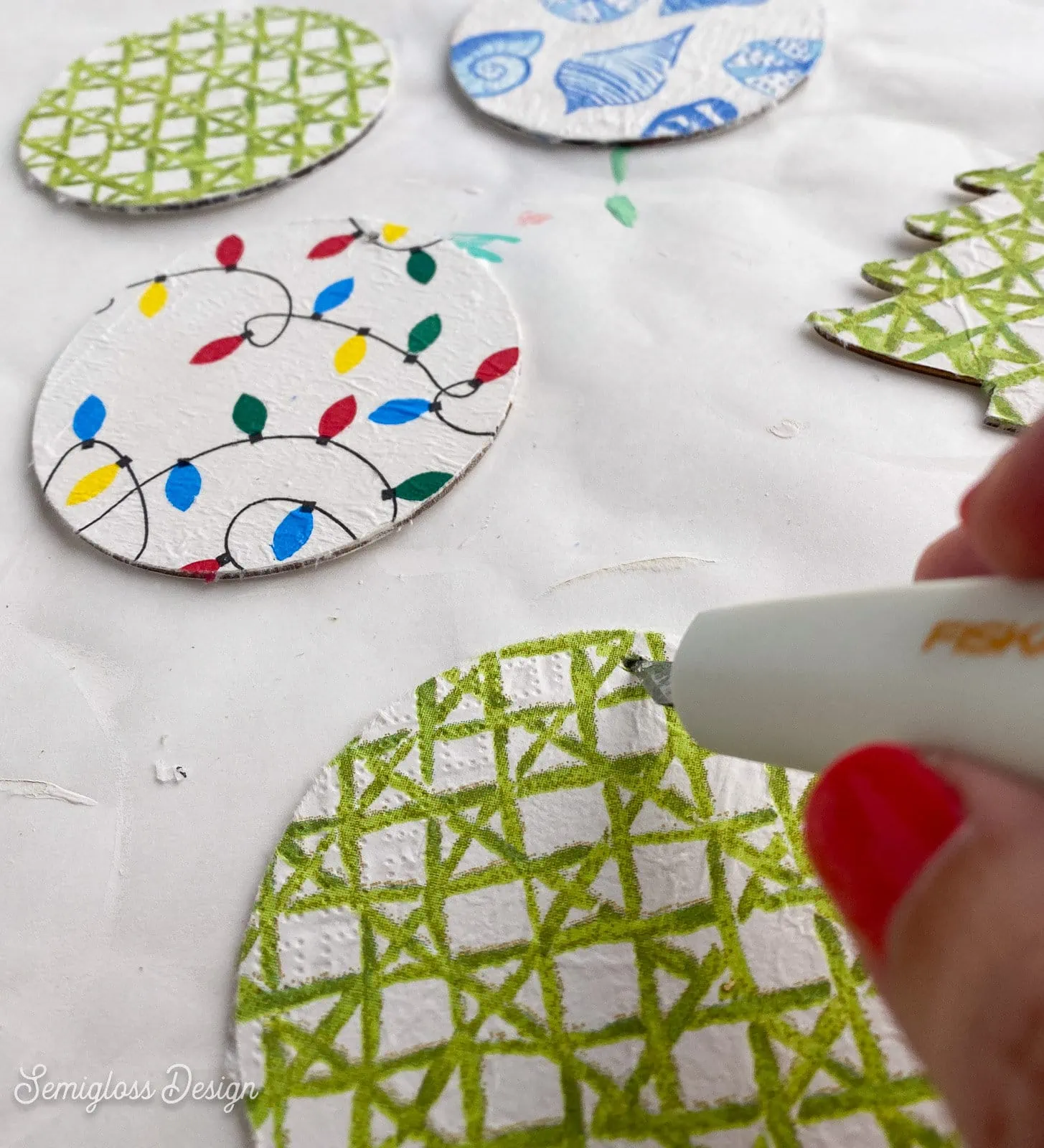 poking hole in ornament with knife