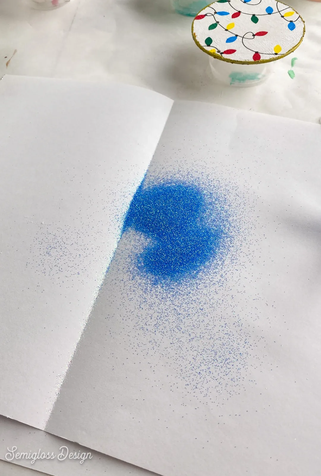 blue glitter on paper