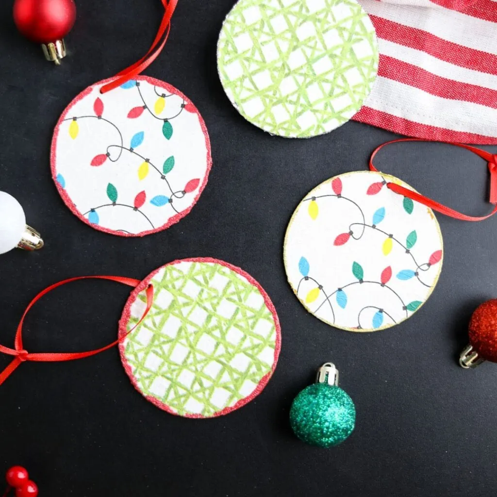 patterned napkin ornaments on black background