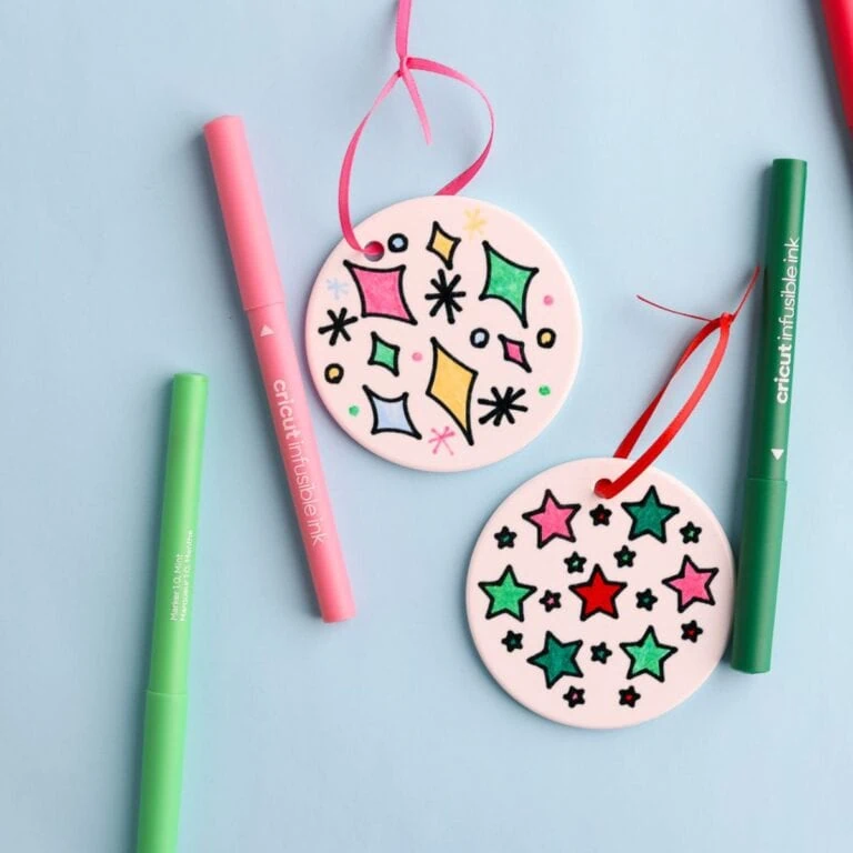 ornaments made with infusible ink markers and the markers