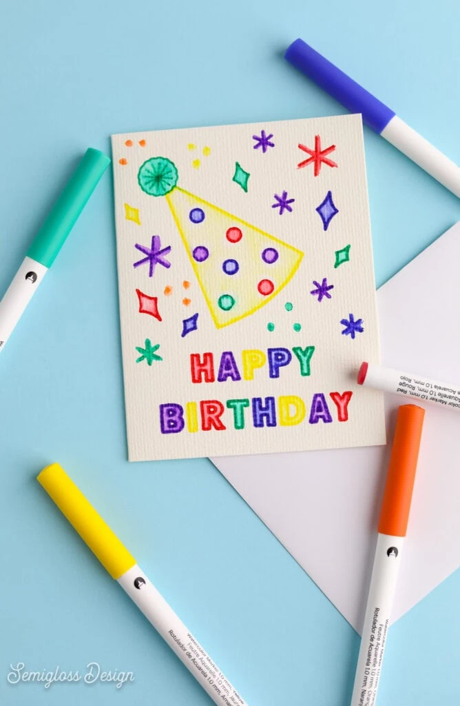 watercolor marker birthday card on blue background