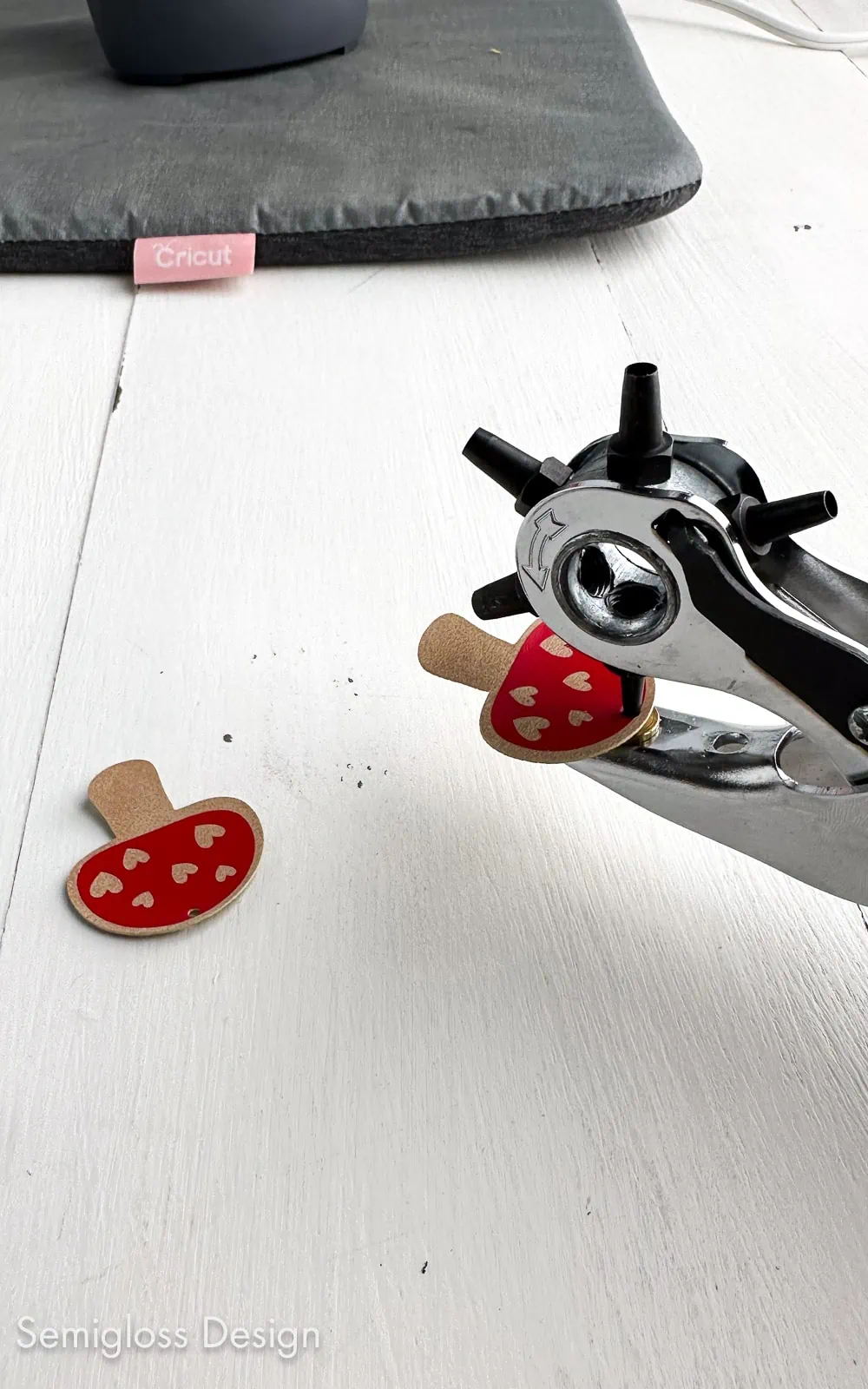 using leather punch on leather earring