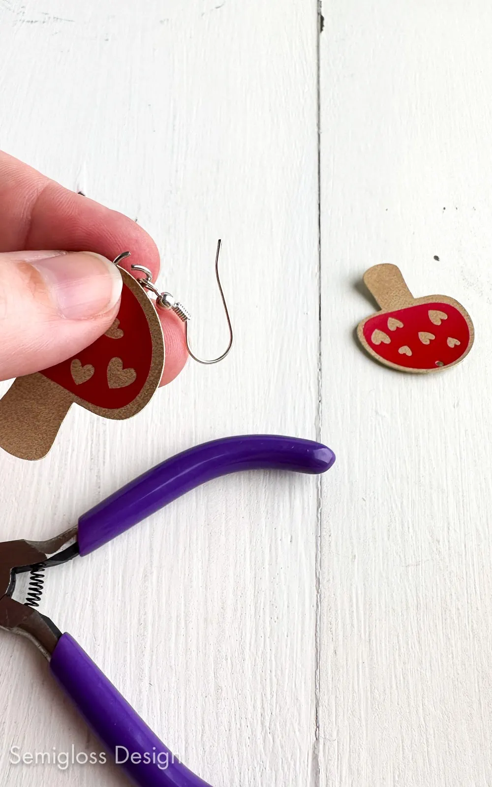 attaching earring to faux leather design