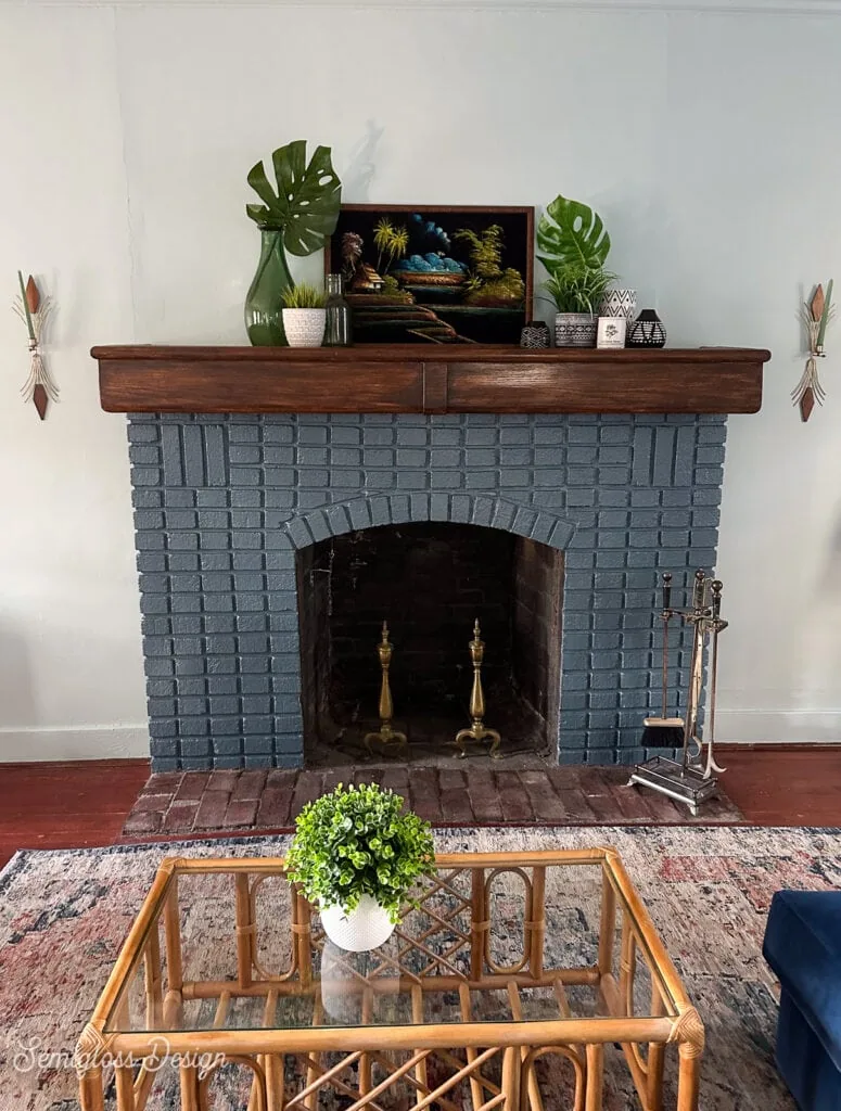 blue painted fireplace in living room