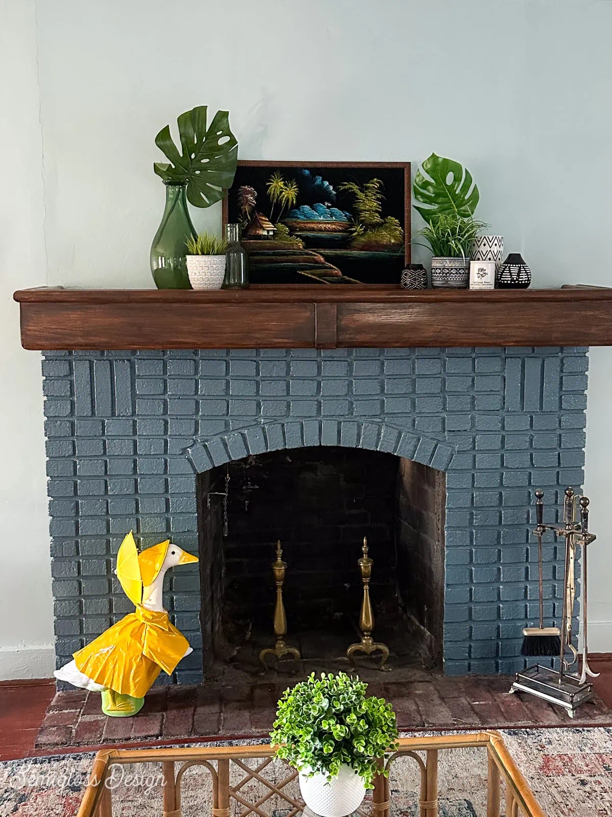 blue painted fireplace with porch goose