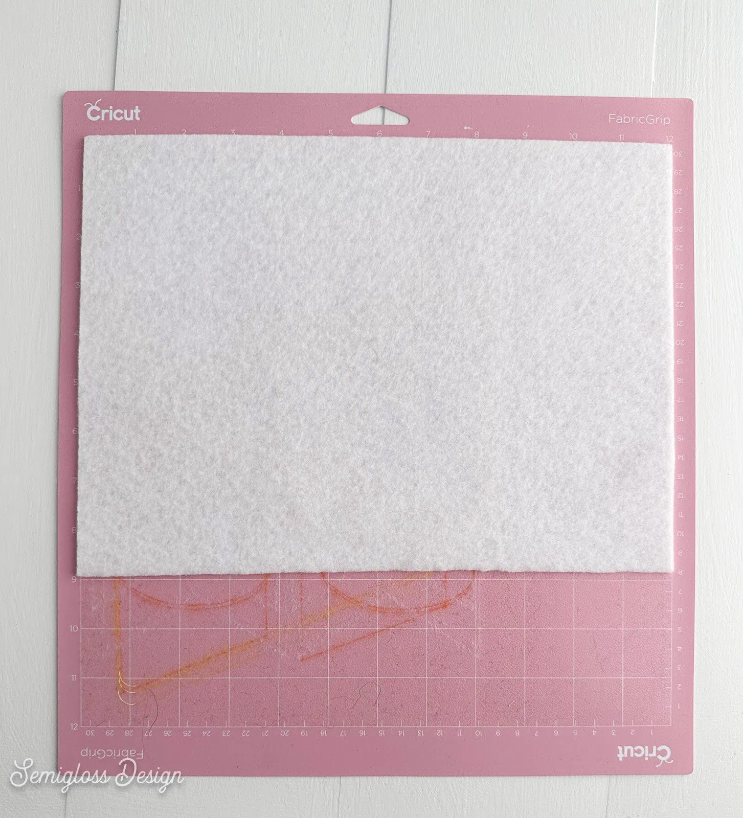 white felt on pink cricut mat