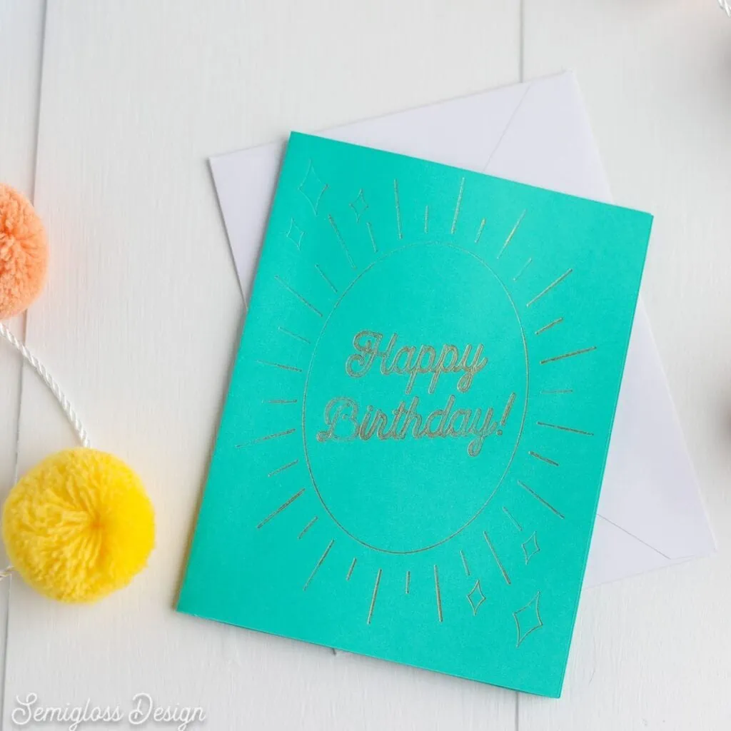 green birthday card with goil foil details