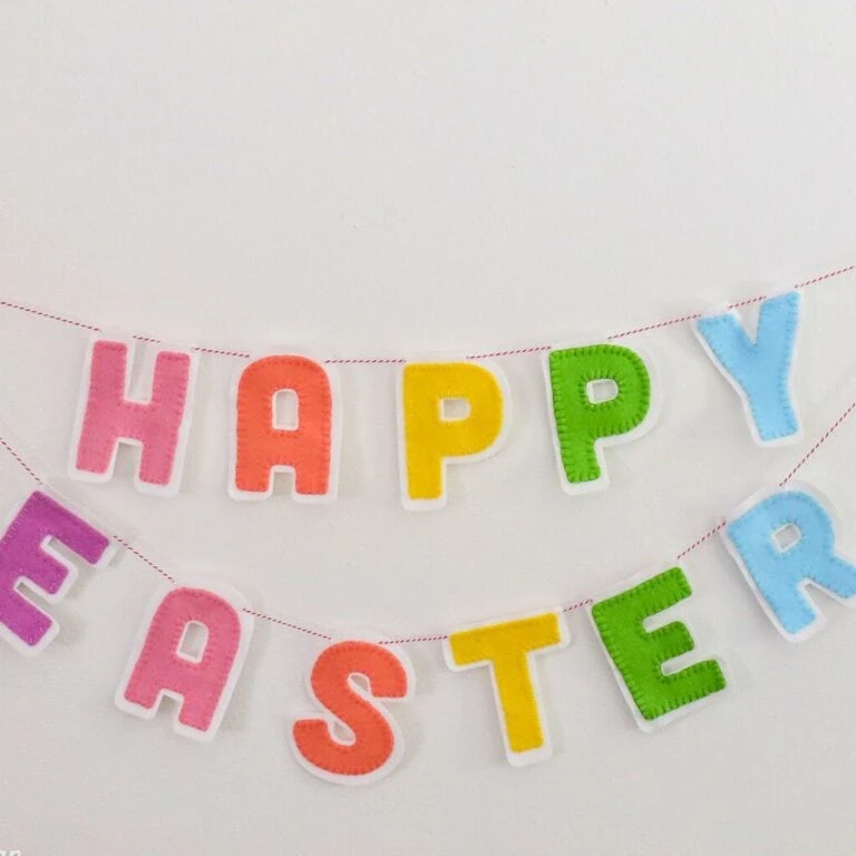 felt happy easter banner on wall