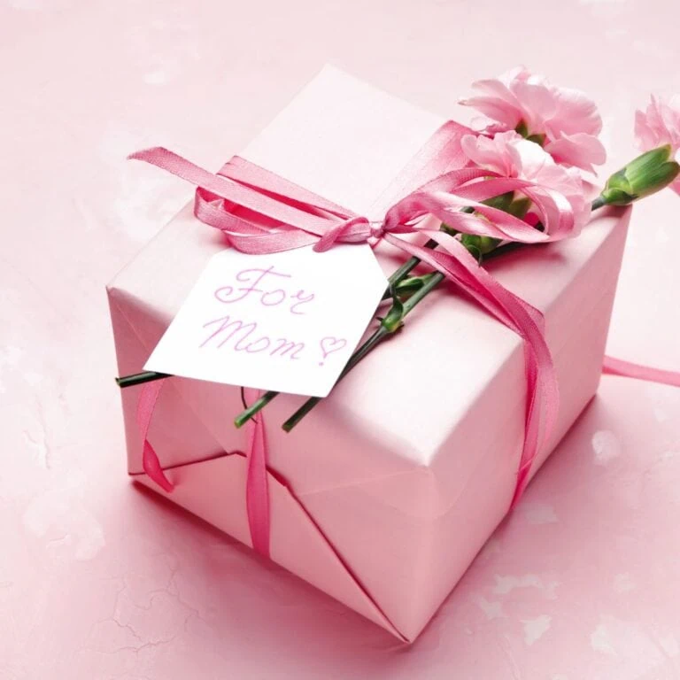 pink gift with tag that says for mom