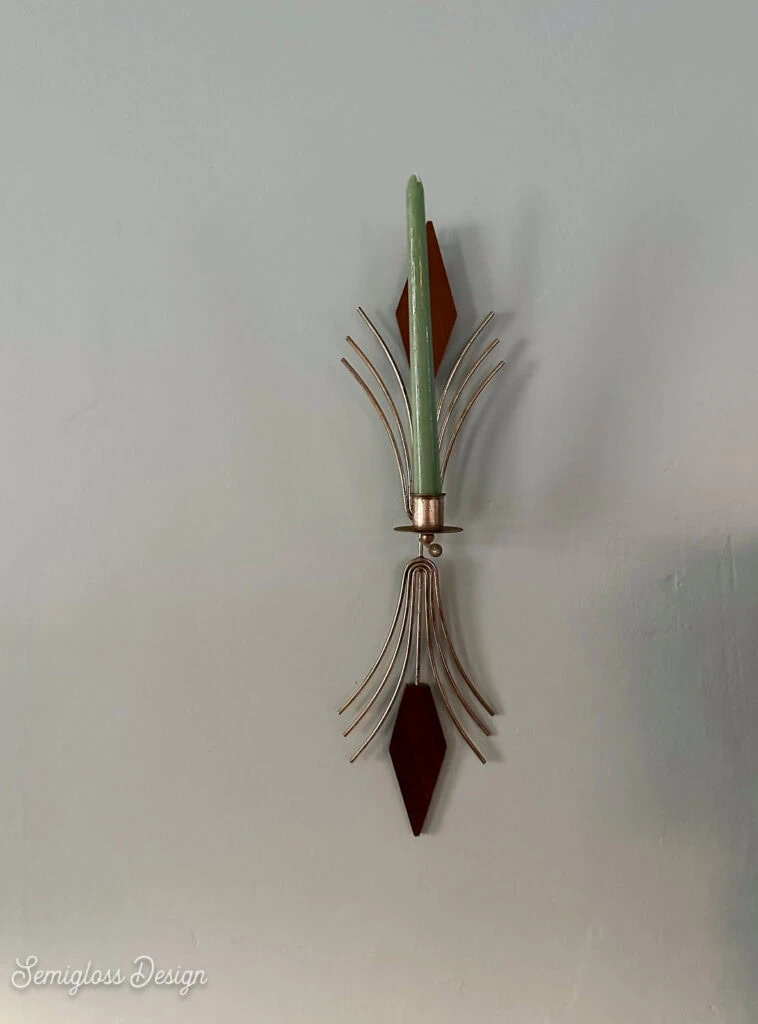 vintage candle holder on wall