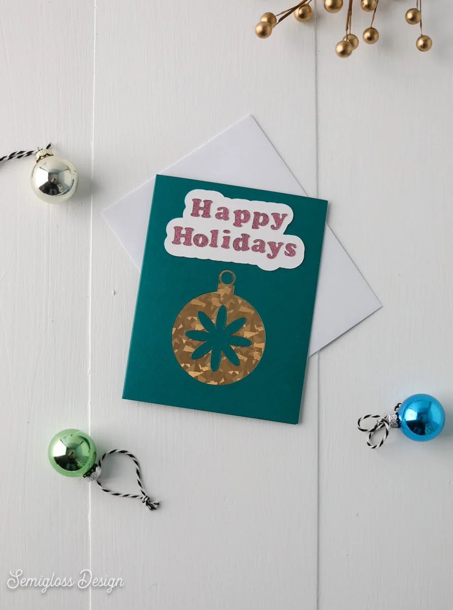 finished cutaway card with gold ornament design
