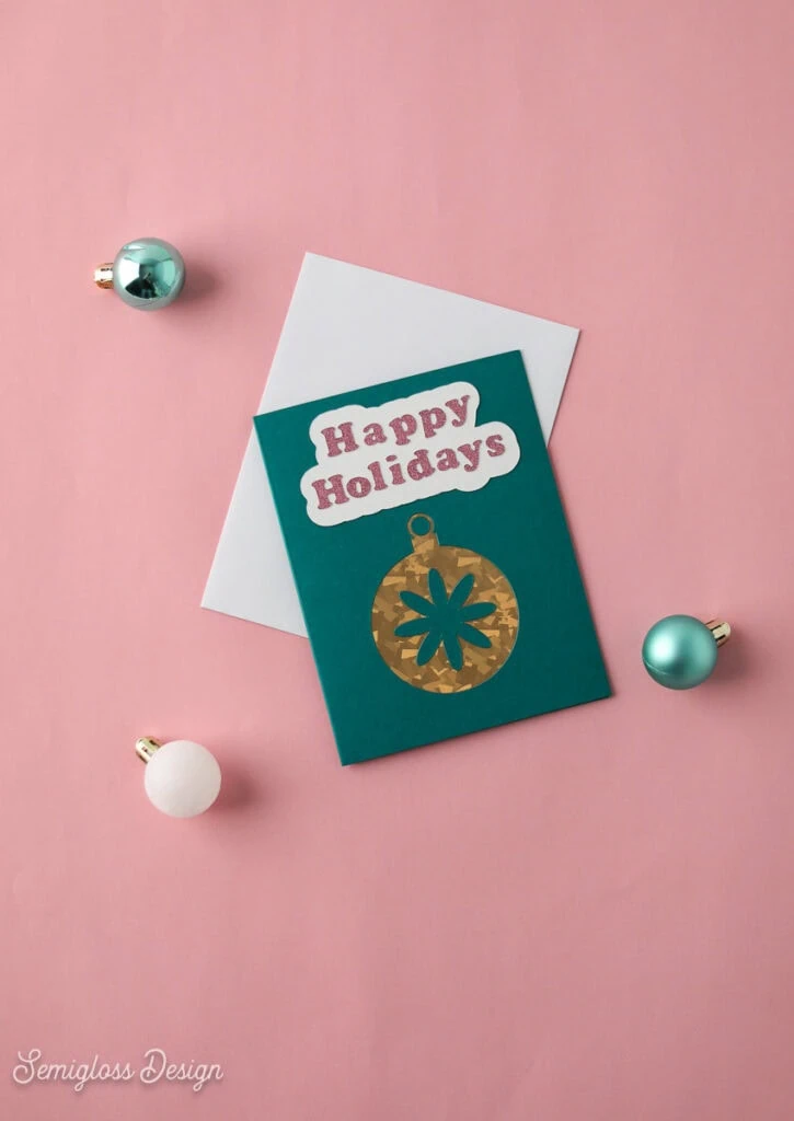 cutaway christmas card on pink background