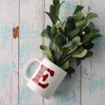 buffalo check letter E mug with greenery