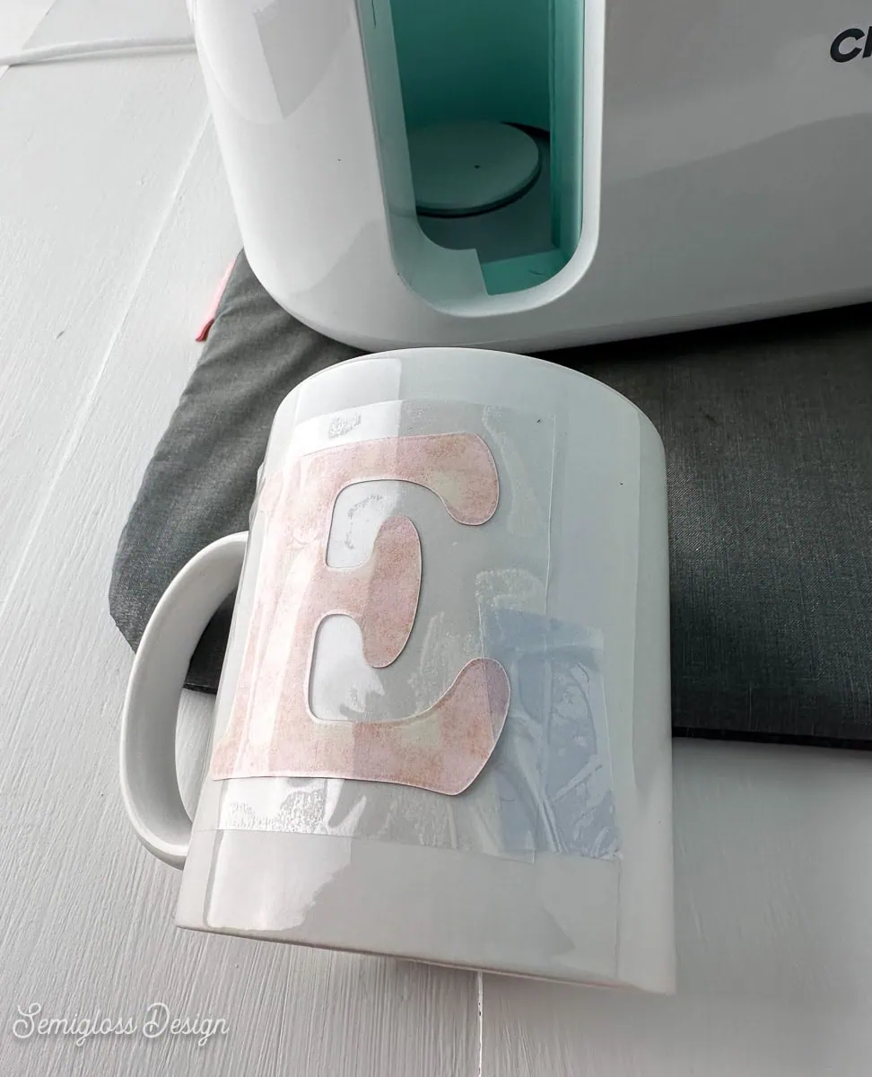 mug with infusible ink design taped in place