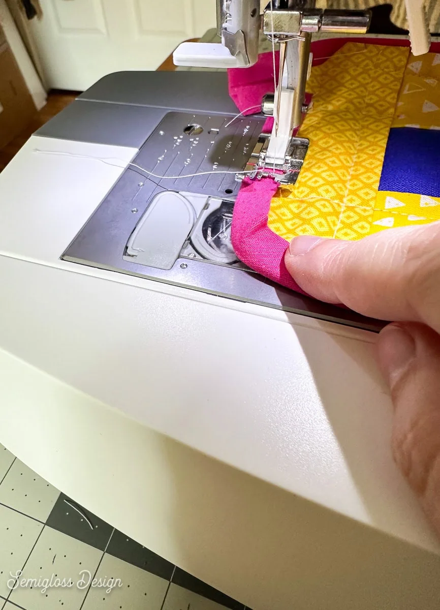 sewing bias tape on coasters