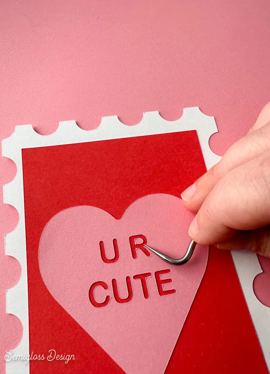 hand using pick tool to place small cardstock element on card