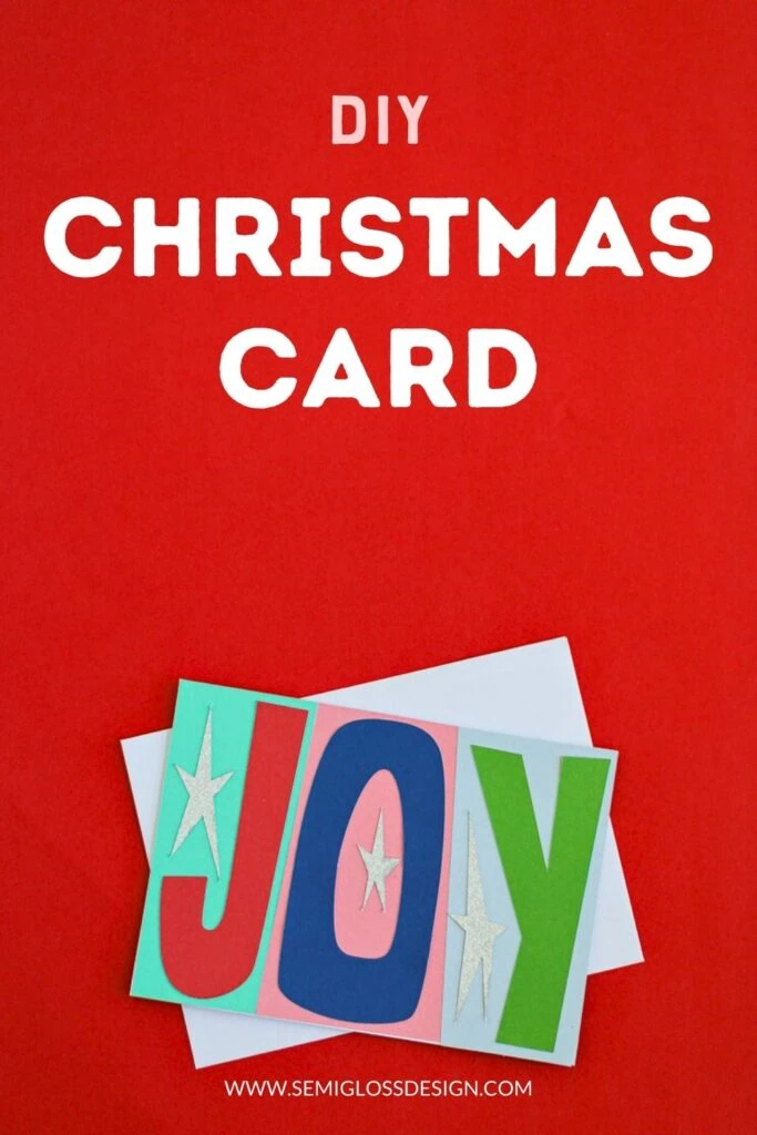 "Joy" card on red background