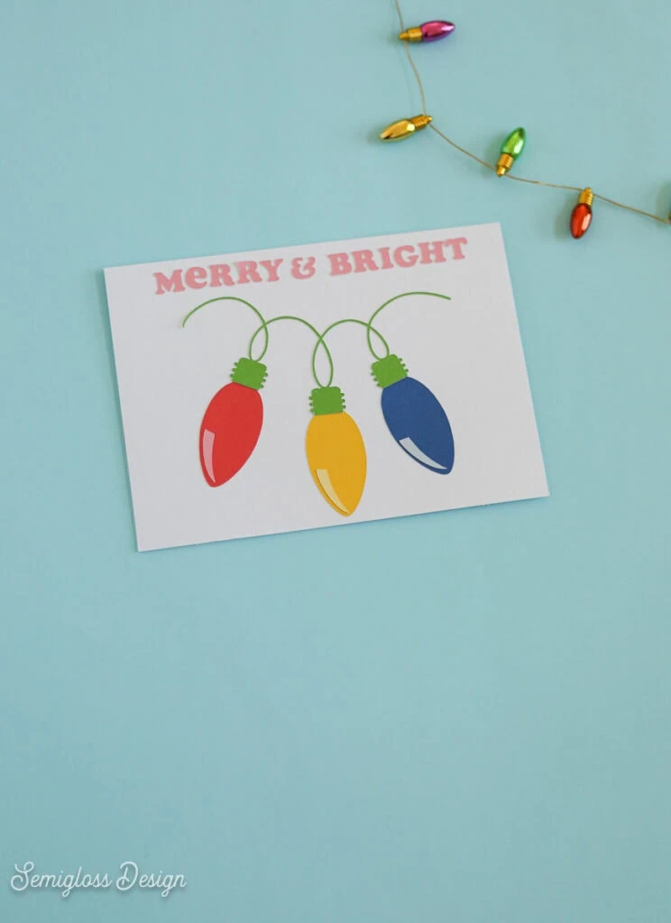 diy Christmas card with paper christmas light shapes