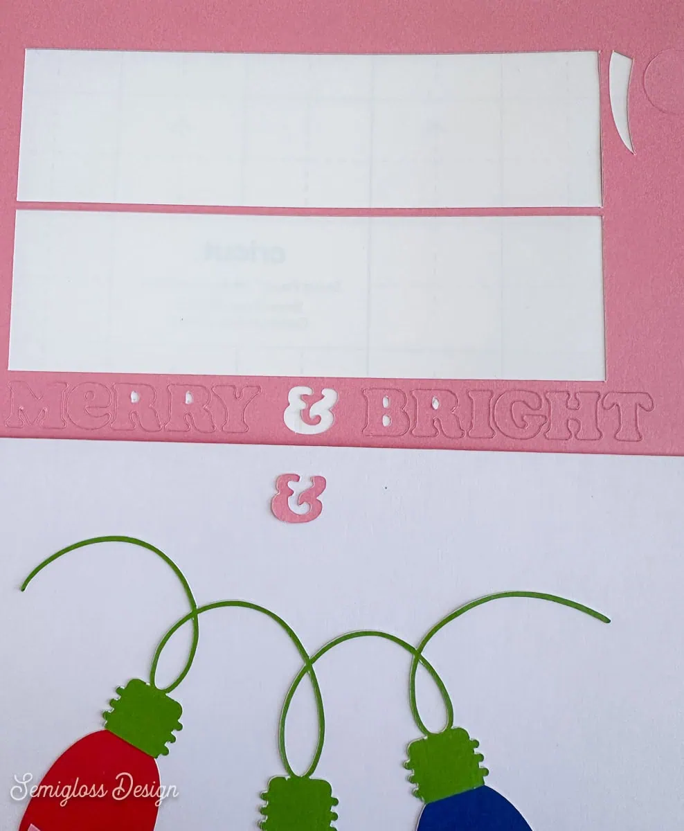 Applying letters to Christmas card