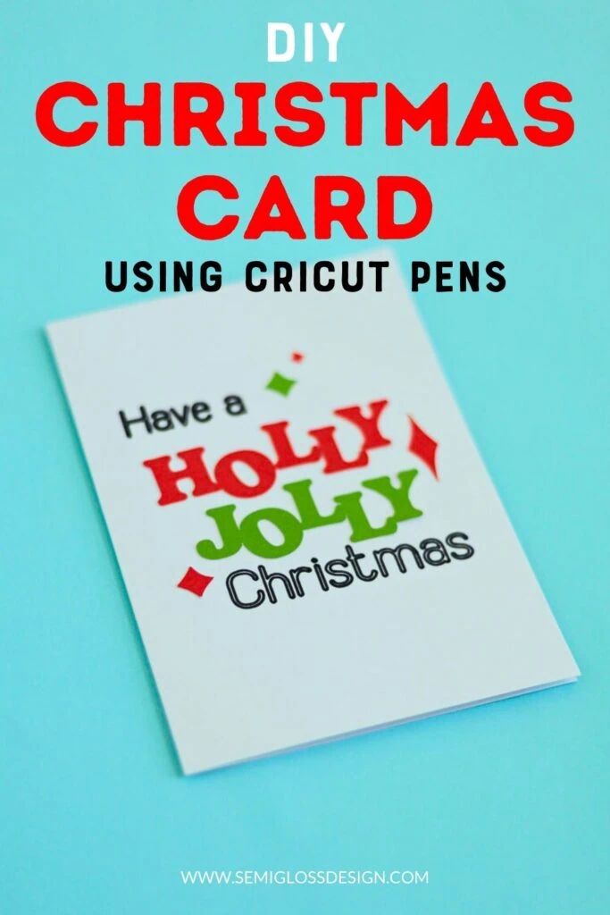 Christmas card with paper lettering that says "Have a Holly Jolly Christmas"