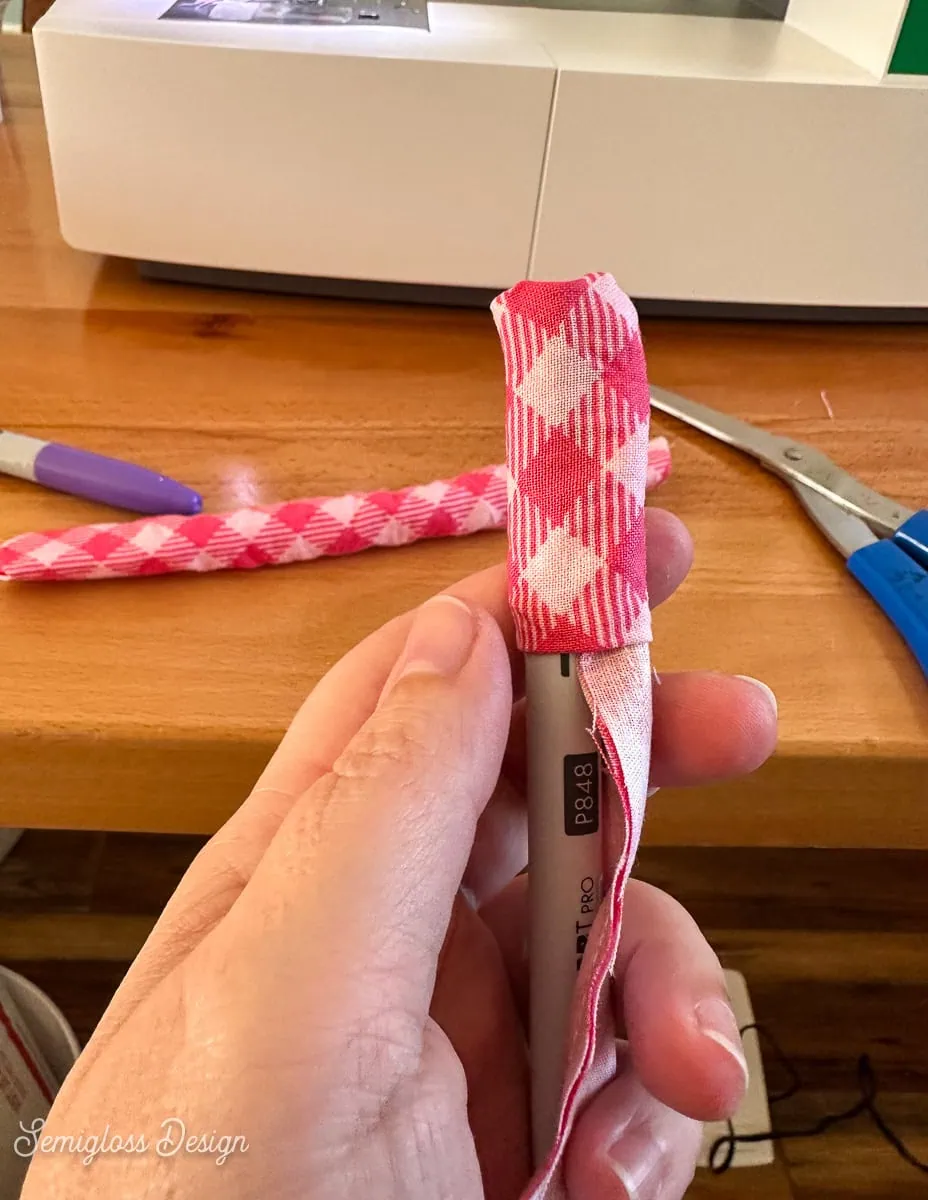 using marker to flip fabric tube inside out