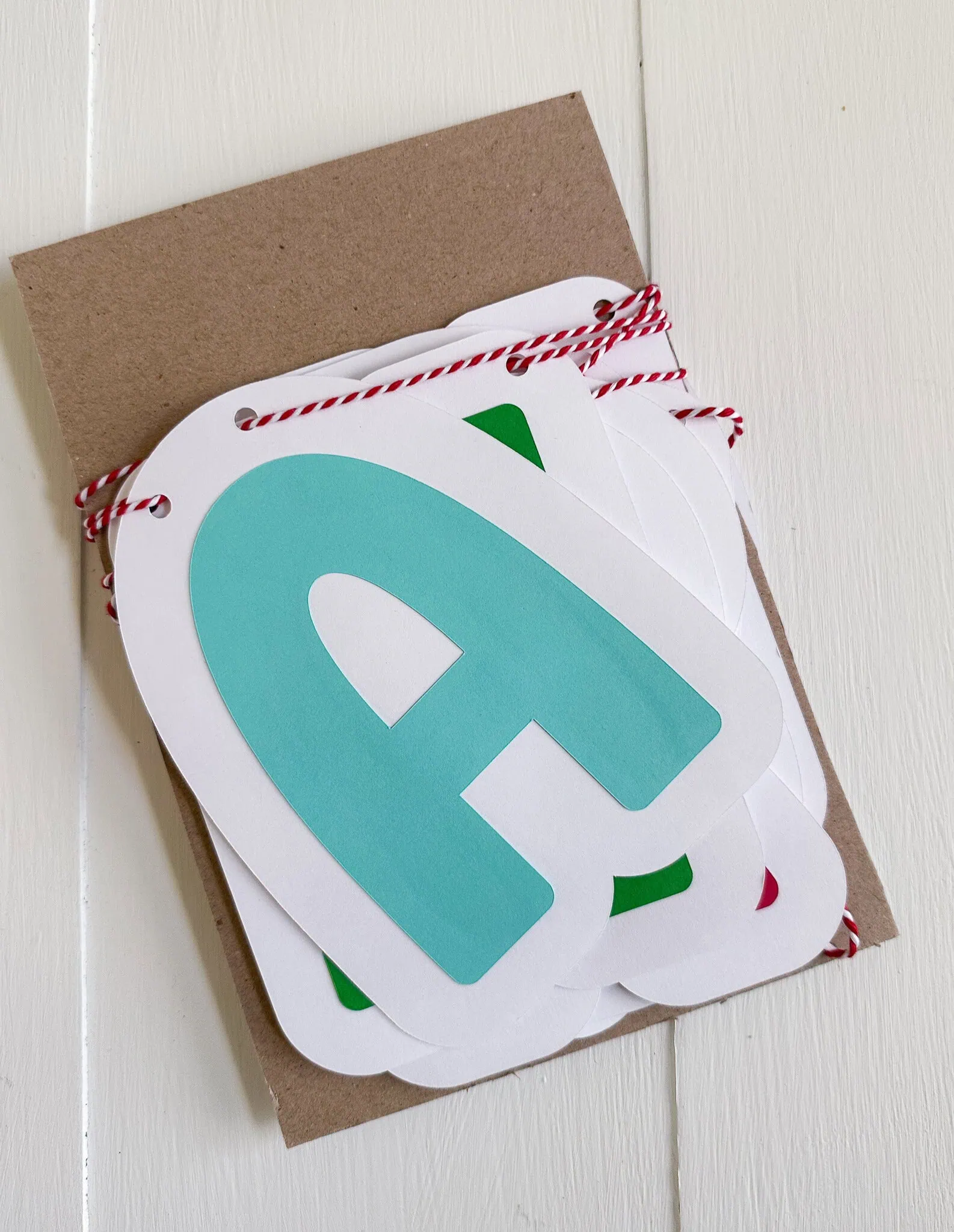 banner stored wrapped around piece of cardboard