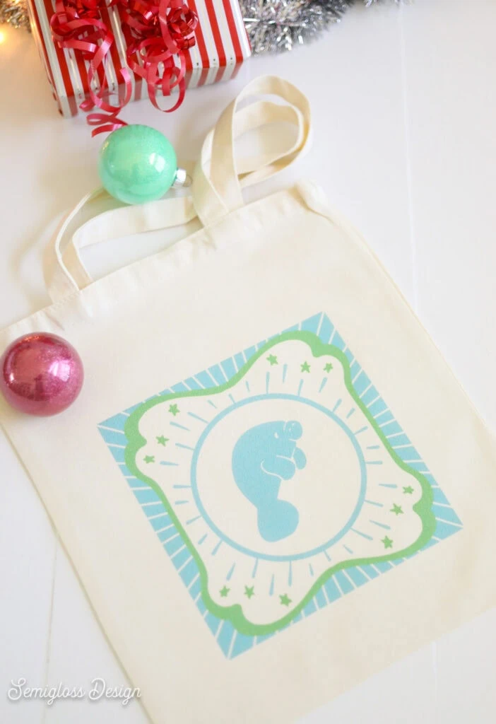 manatee tote bag with ornaments and present