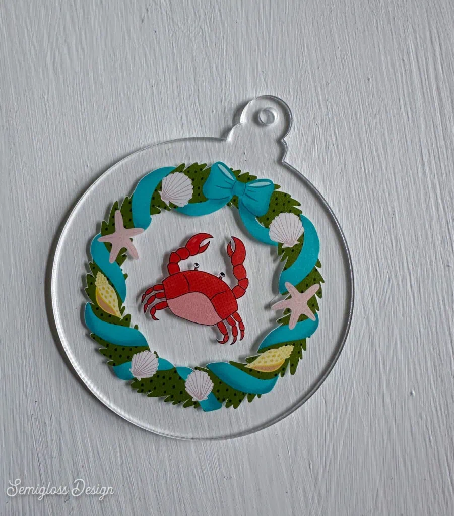 ornament with seashell wreath and crab