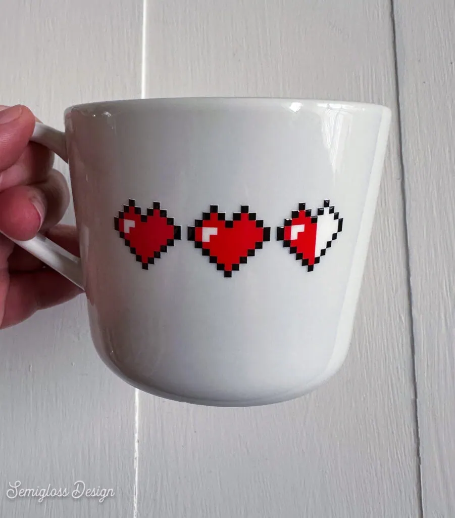 mug with pixel hearts