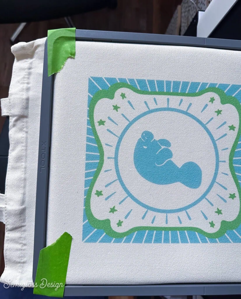 printing manatee totebag in xTool O1 Omni printer