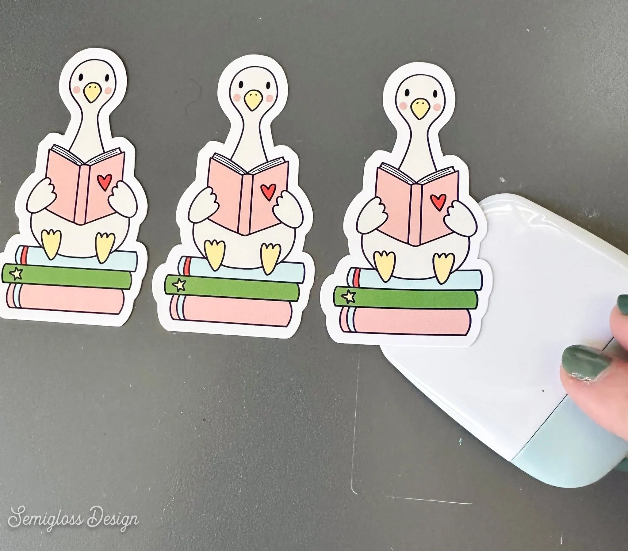 peeling stickers from xTool O1 Omni baseplate