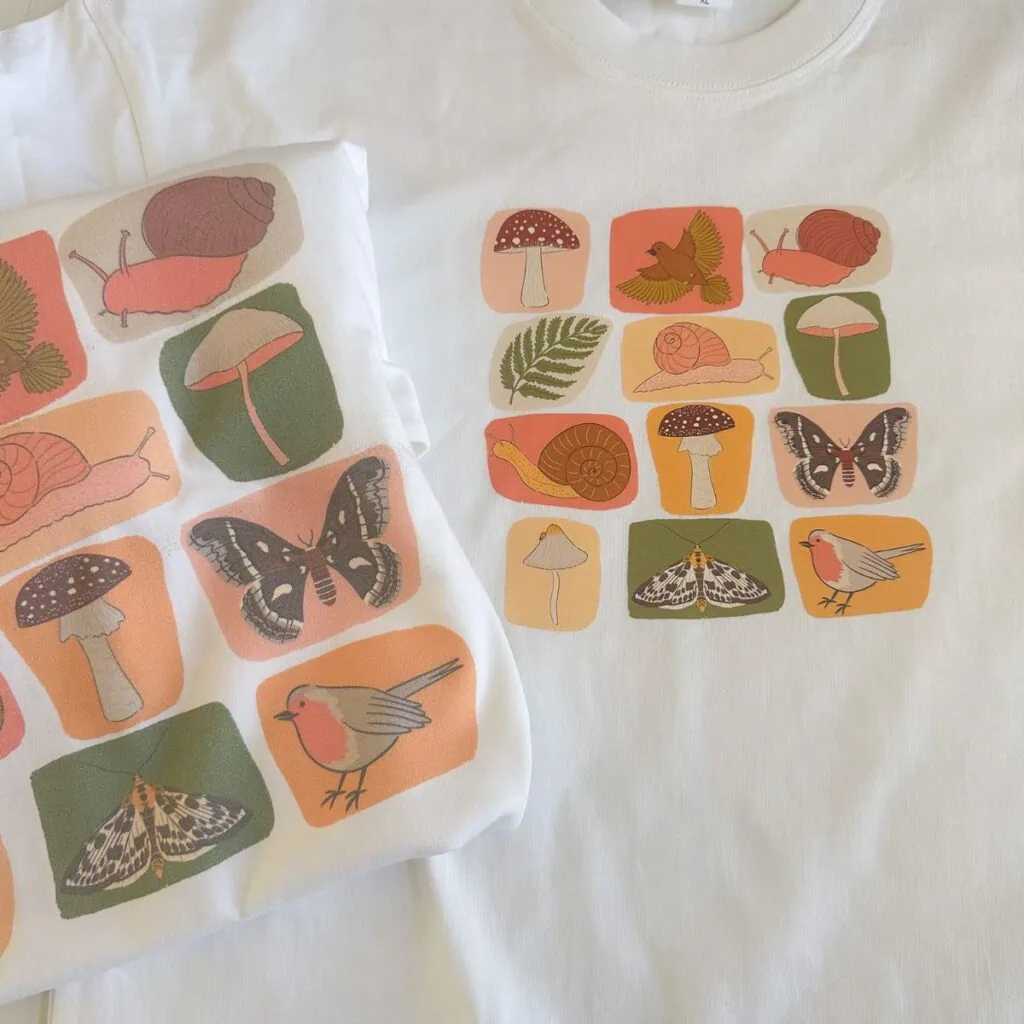 2 shirts printed at home featuring birds, moths, snails, and mushrooms