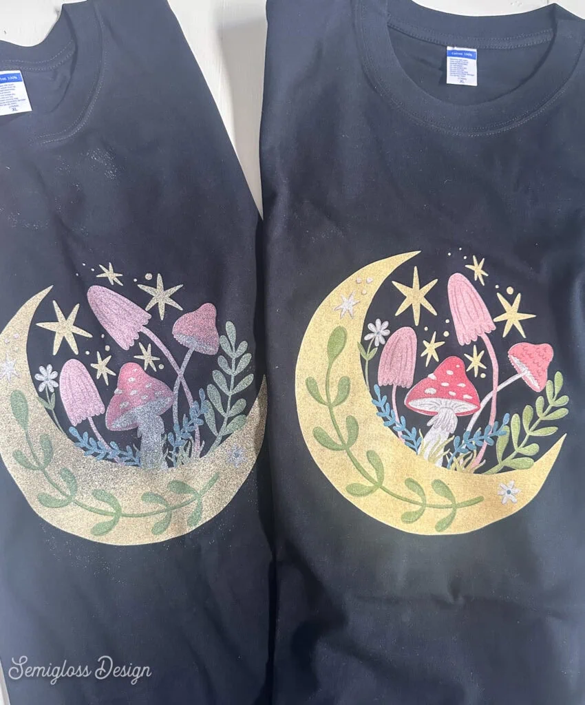 two black shirts with moon and mushroom designs